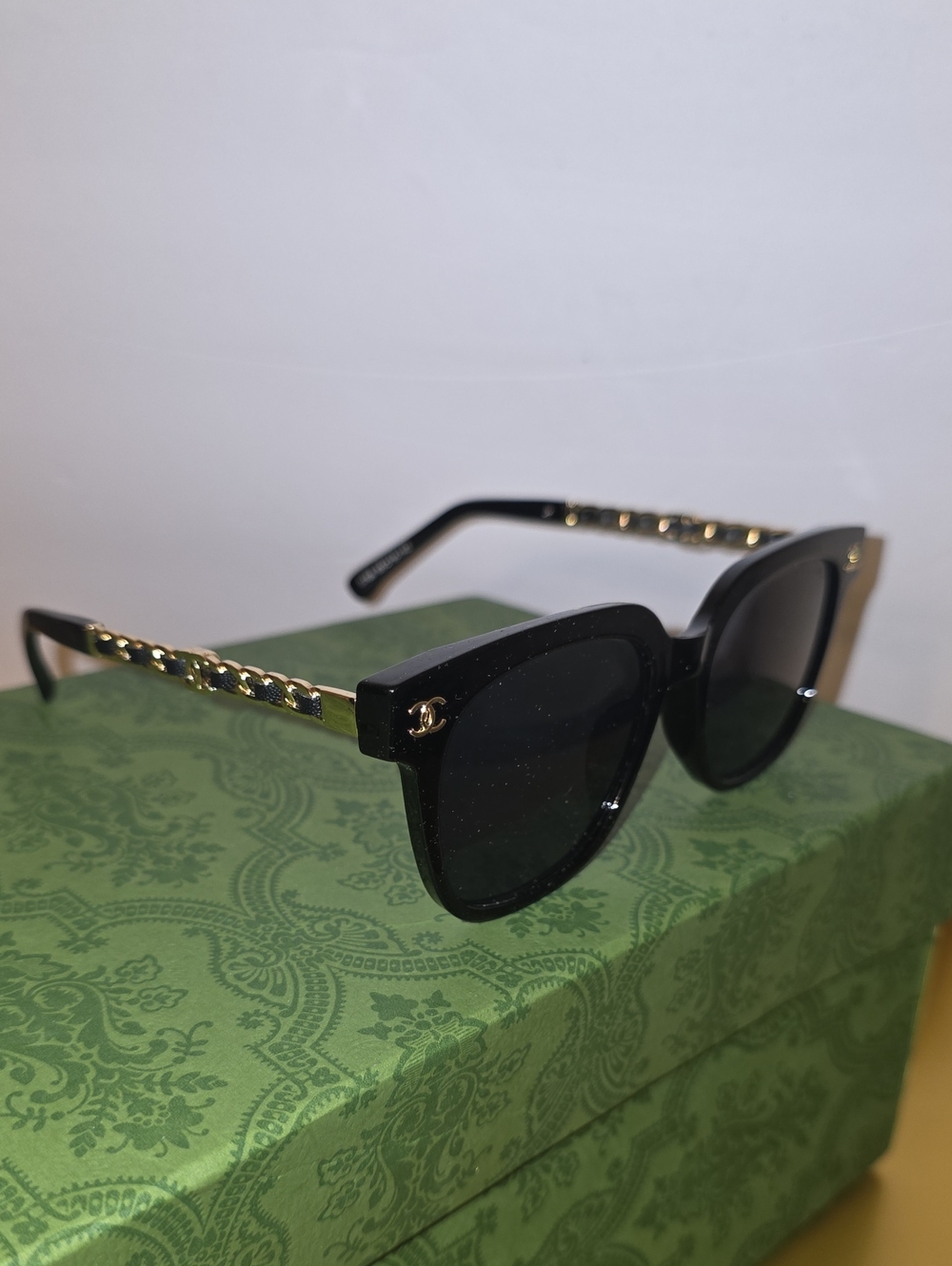 CHANEL Black Sunglasses with Gold Chain-Detail Temples